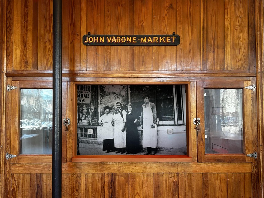 historic photos and sign inside venue