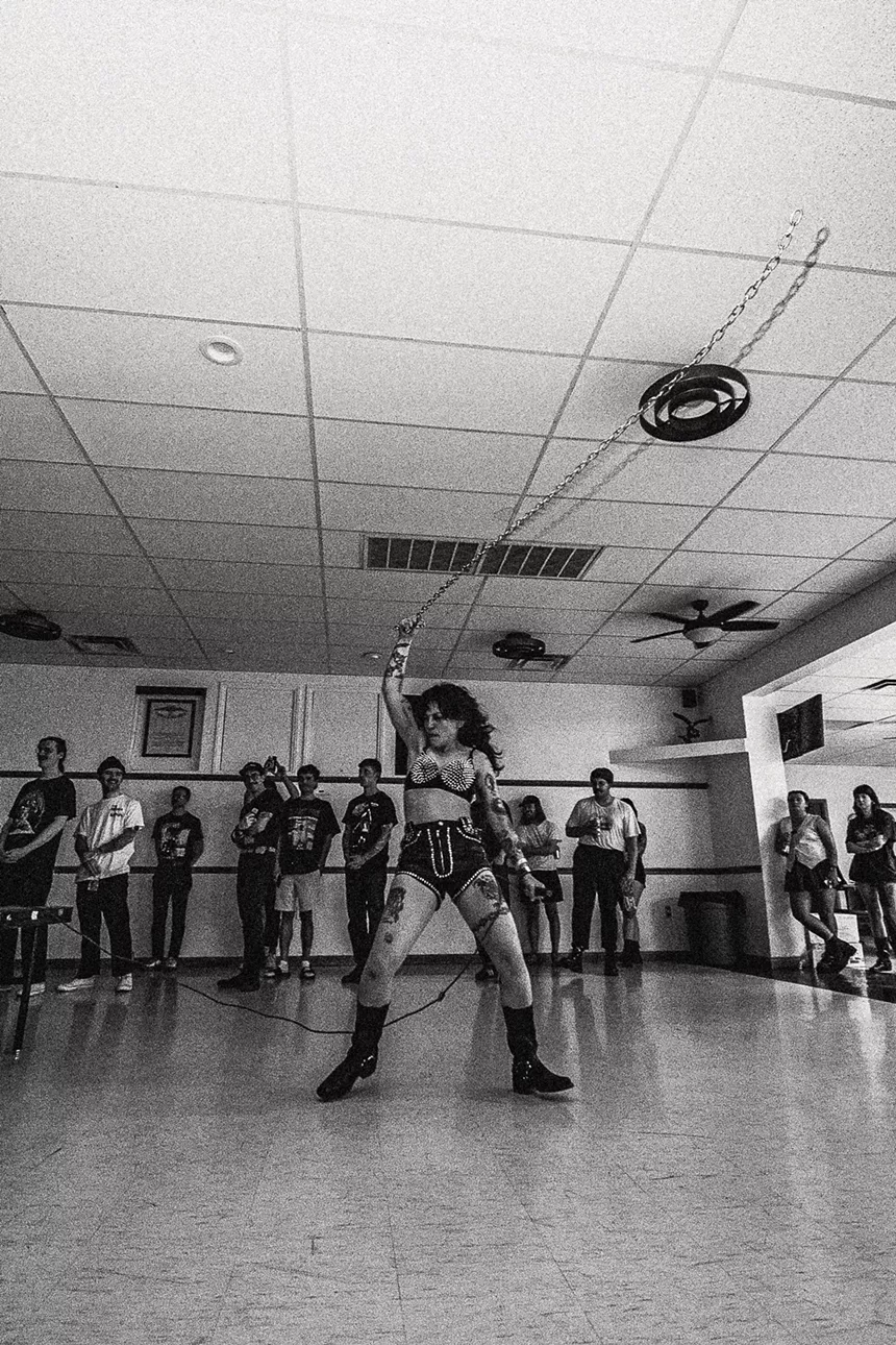 woman whipping a chain around