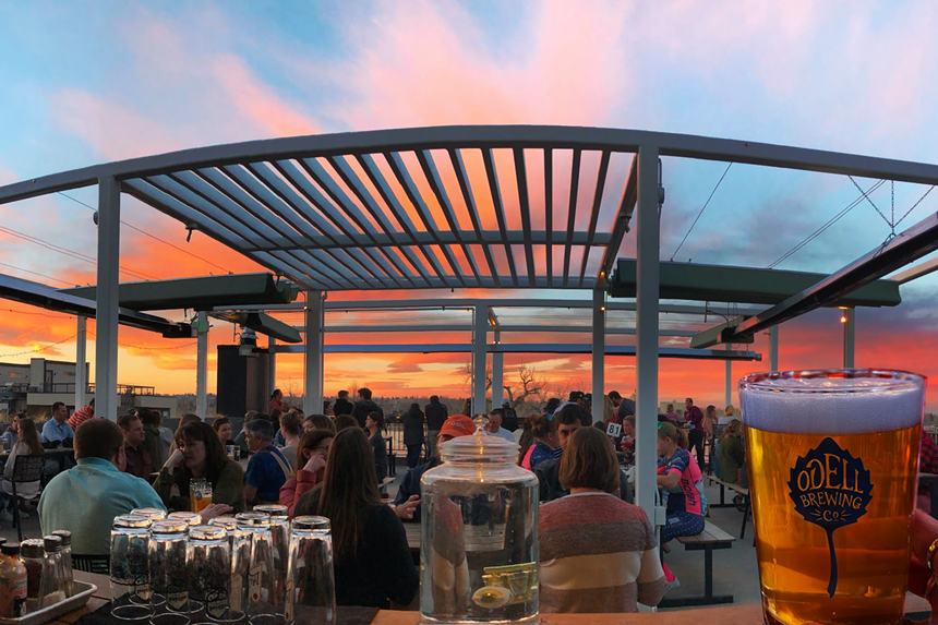 brewery rooftop patio at sunset