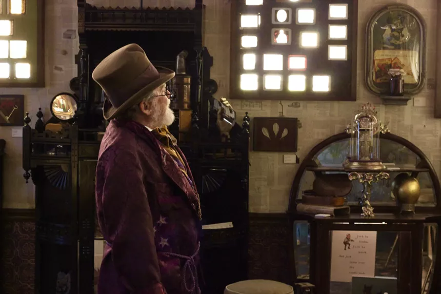 man in a top hat