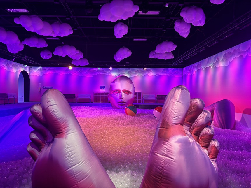 ball pit with a blowup person inside