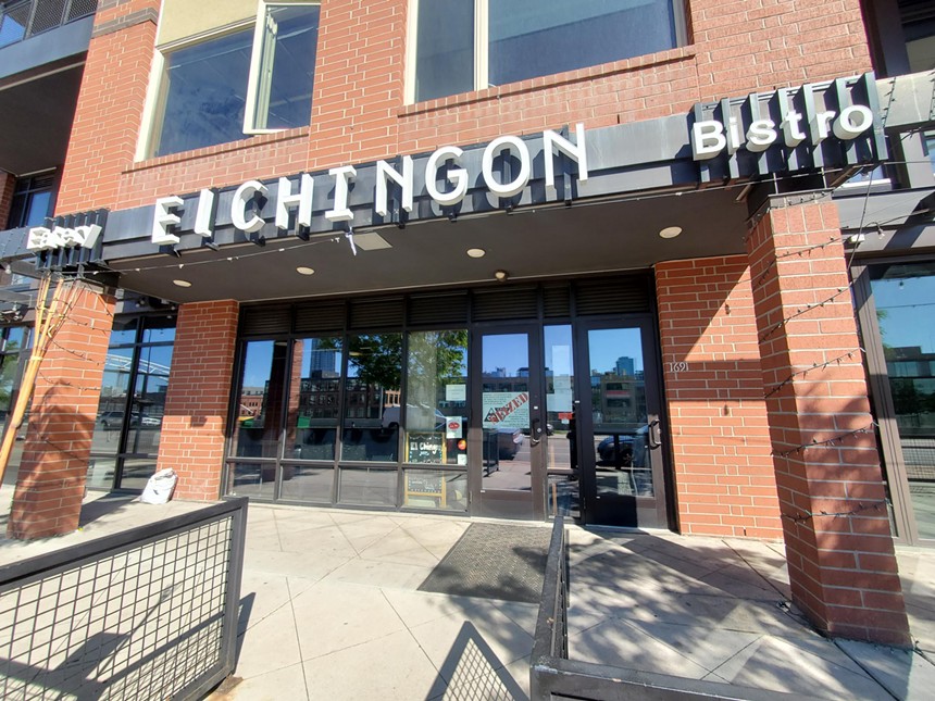 "el chingon" sign on the front of a brick building