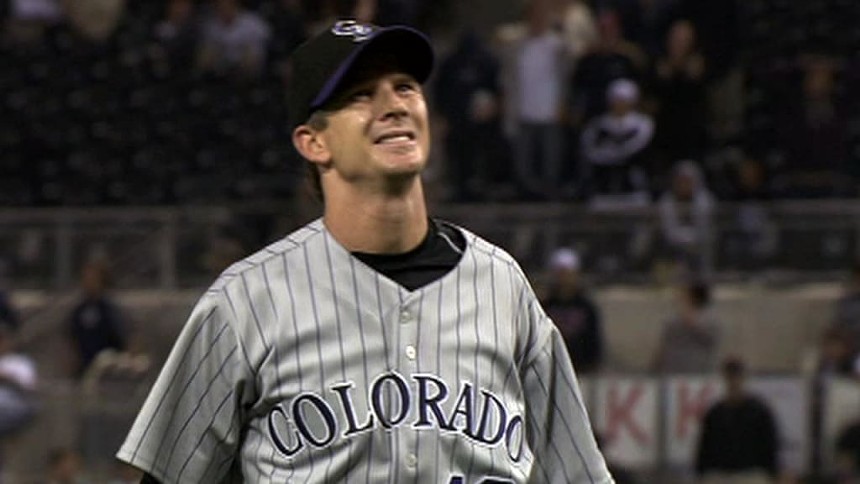 A Rockies player looking upset.