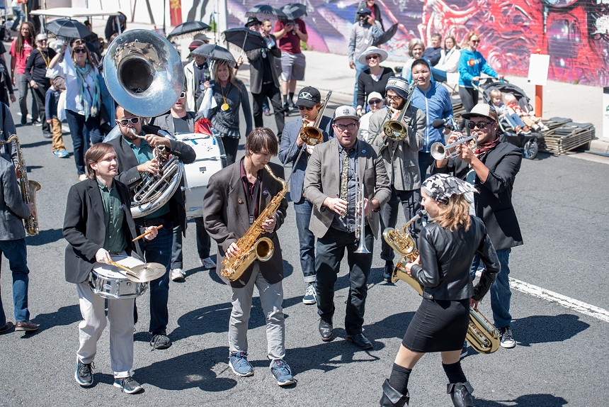 brass band performing in the street