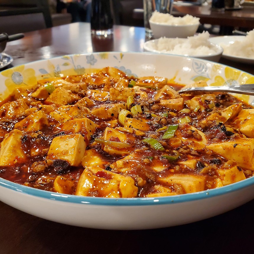 cubes of tofu in a red sauce