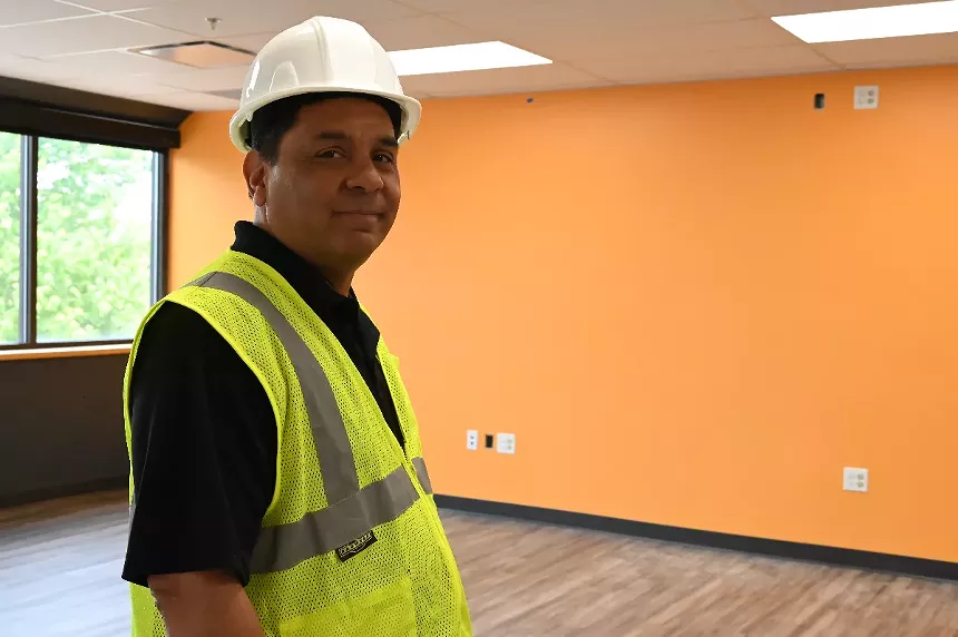A man stands in a room.