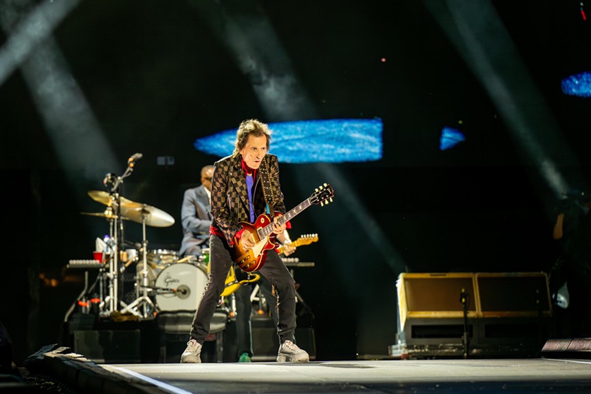 rolling stones performing at empower field in denver