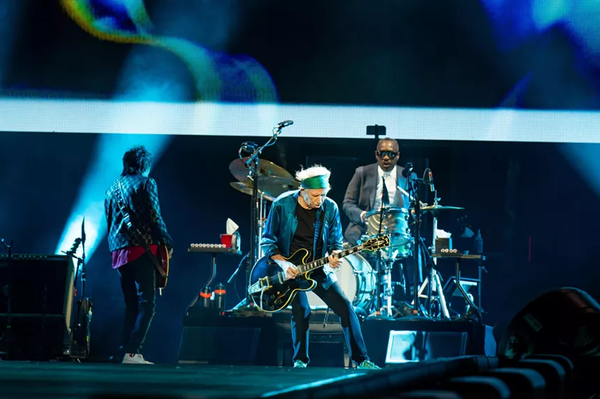 the rolling stones performing at empower field in denver