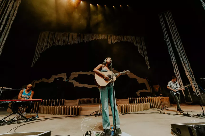Jensen McRae performing on stage
