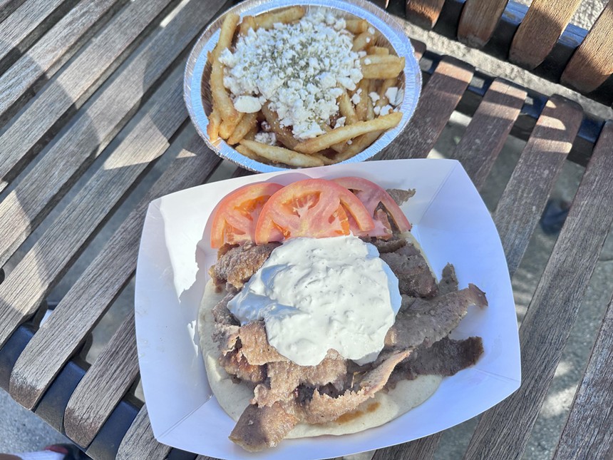 Gyro and fries topped with crumbled feta and Greek oregano.
