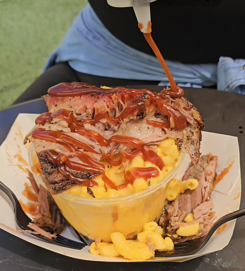 Brisket and mac and cheese in a bowl.