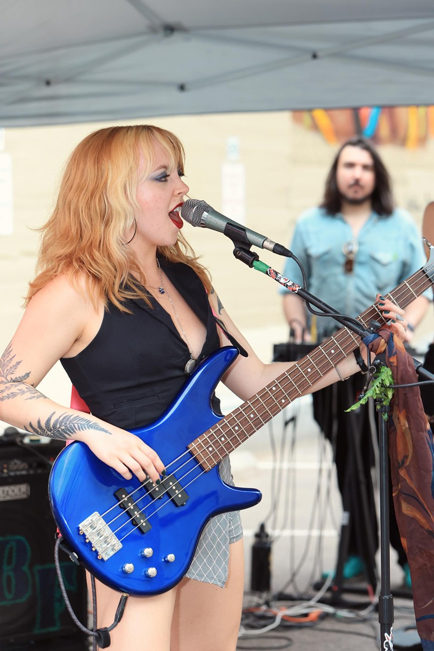 Denver band May Be Fern performs a concert in the parking lot of Westword