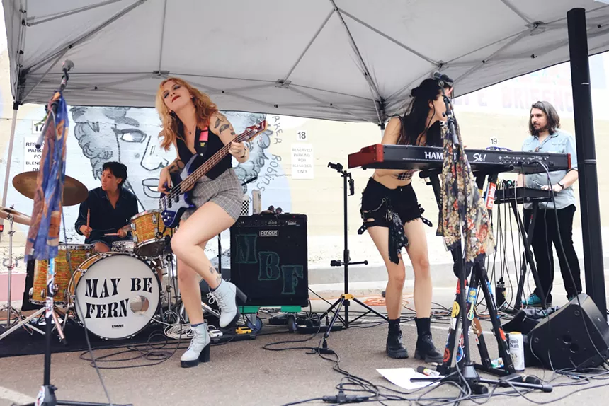 Denver band May Be Fern performs a concert in the parking lot of Westword