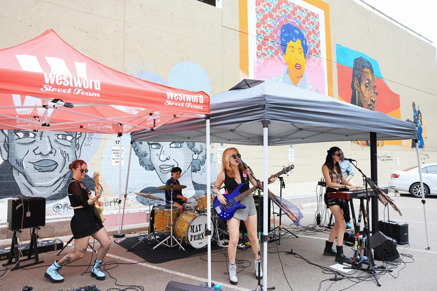 Denver band May Be Fern performs a concert in the parking lot of Westword