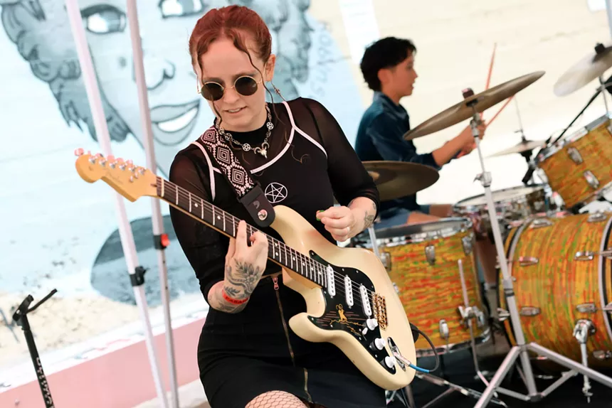 Denver band May Be Fern performs a concert in the parking lot of Westword