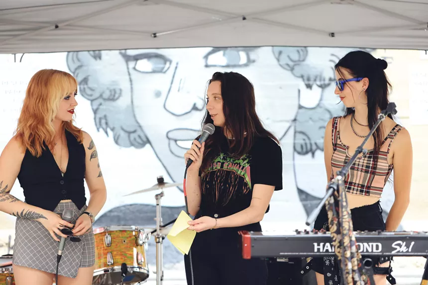 Denver band May Be Fern performs a concert in the parking lot of Westword
