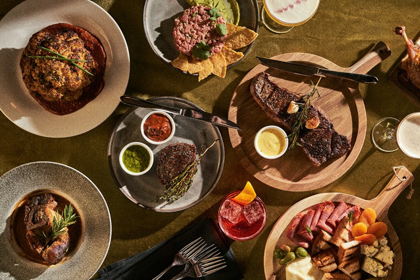 various dishes on plates on a table