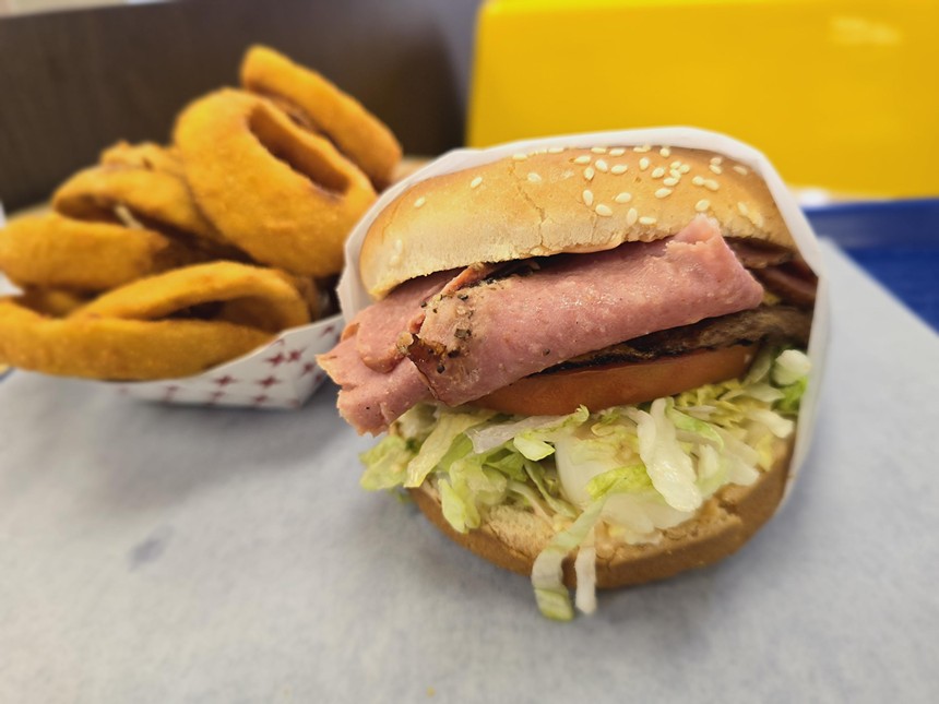 a burger topped with pastrami