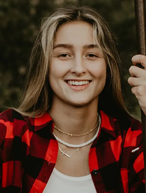 woman in red and black checked shirt