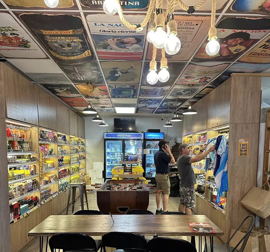 interior of a market with two tables for dining
