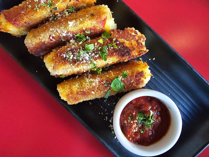 breaded mozzarella sticks and a side of marinara