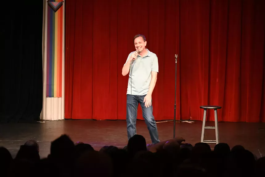 standup comedian performing
