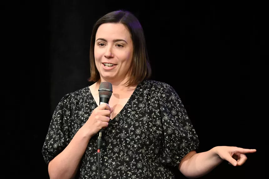 standup comedian performing