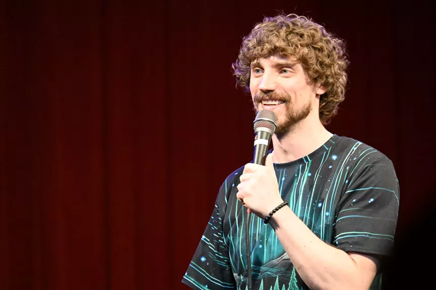 standup comedian performing
