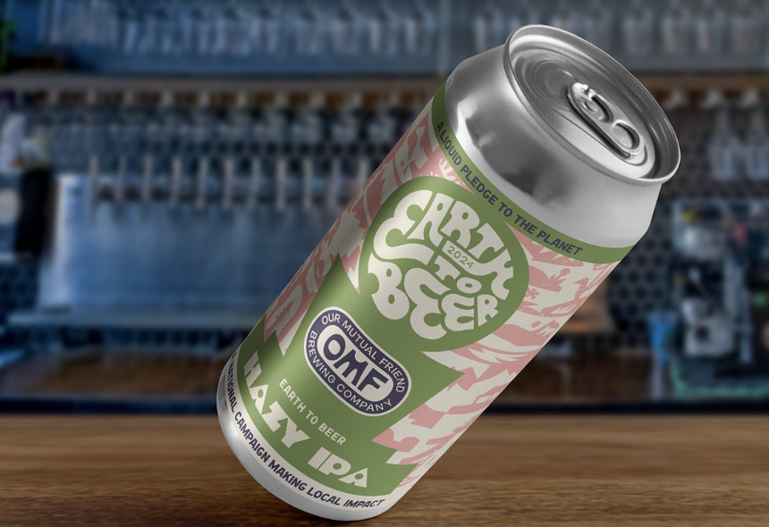 Beer can on a bar top.