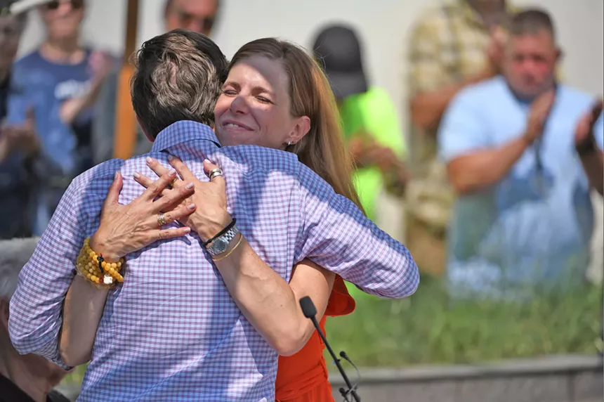 Man and woman hug