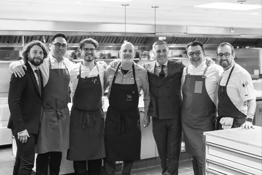 black and white photos of a group of men in aprons and two in suits