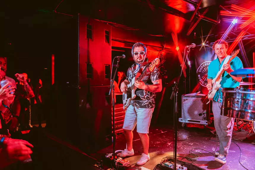 band performing at the Underground Music Showcase in Denver