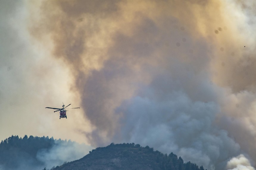 Helicopter flies into wildfire