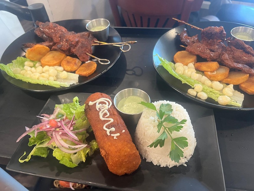 rice, salad and fried potato on a plate