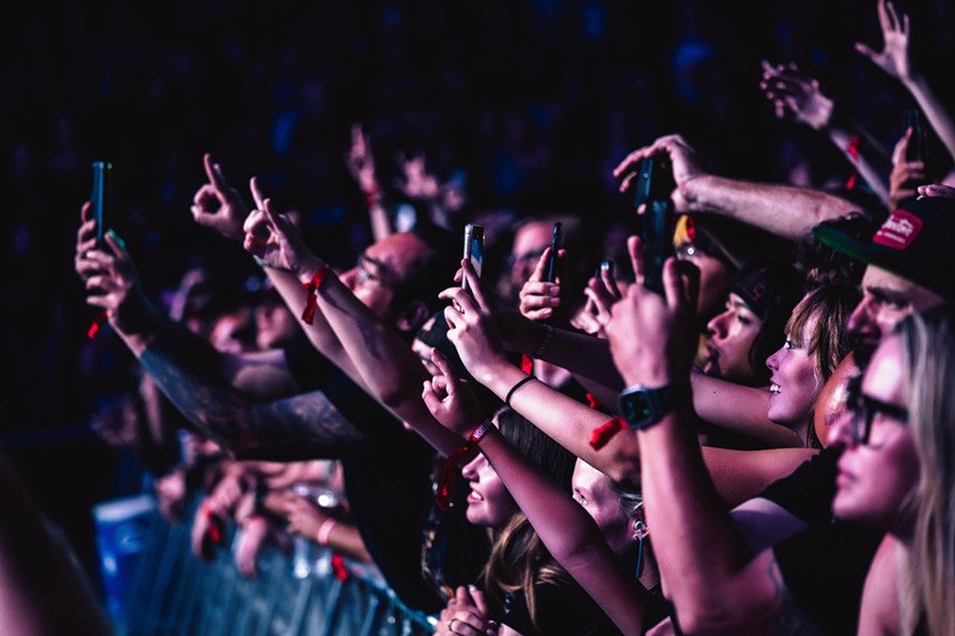 Fans look on as Megadeth lights up the stage. Jason Myers (@memorandum_media)