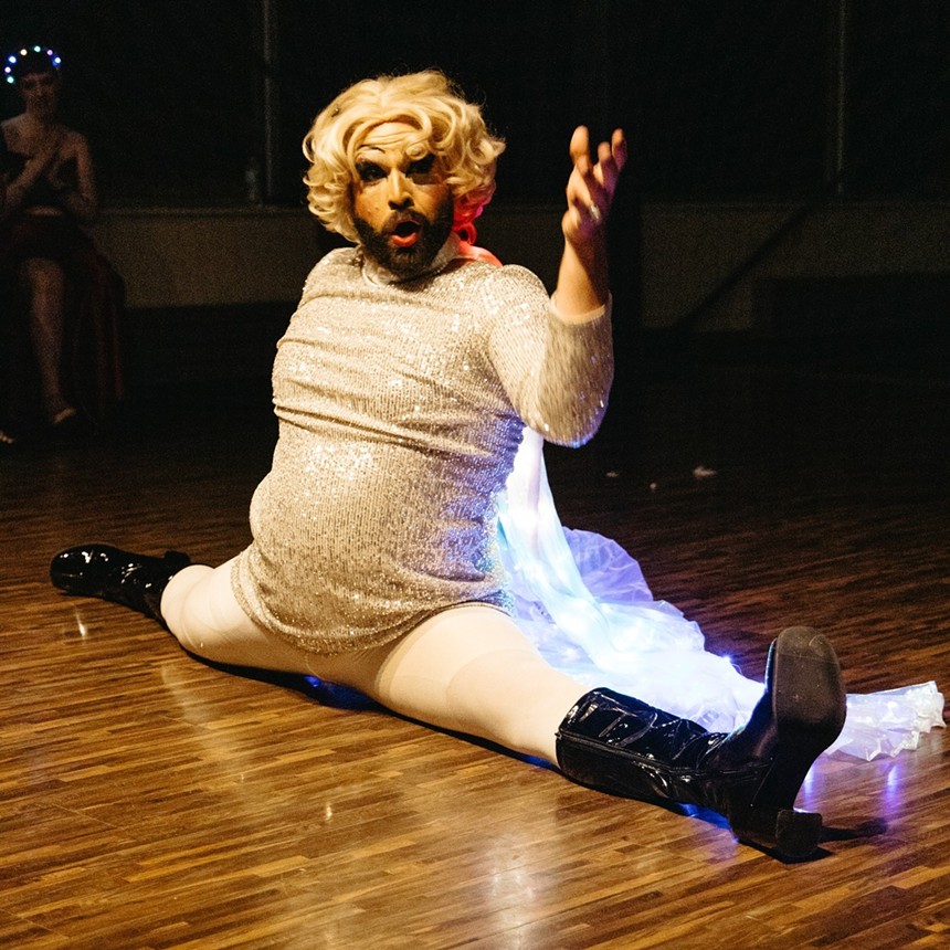 drag star with beard.