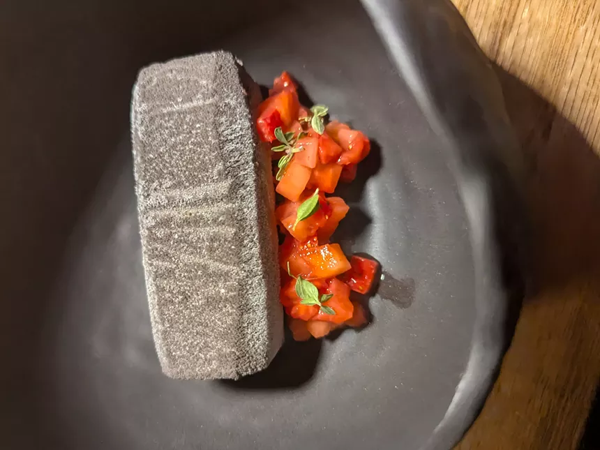 a grey brick of ice cream on a plate