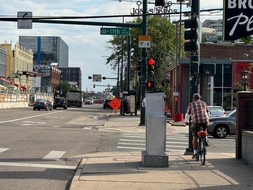 A man bikes.