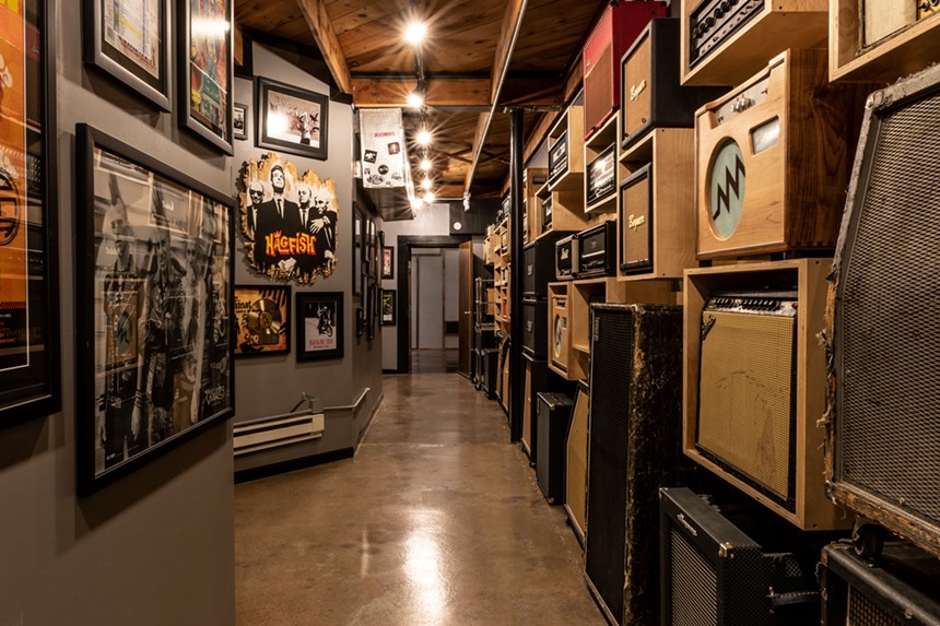 a hallway of music gear