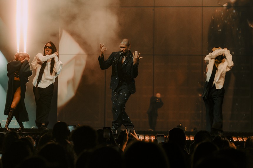 Usher performing at Ball Arena in Denver for his Past Present Future Tour