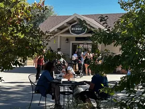 people outside coffeehouse