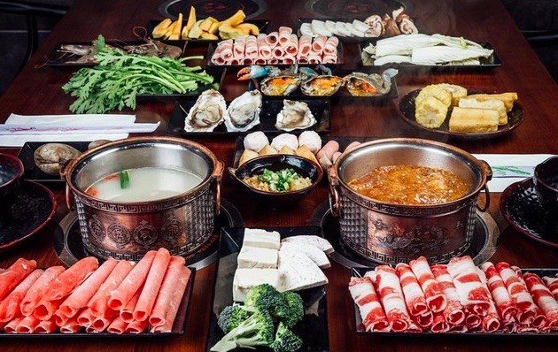 spread of hot npot meats and veggies