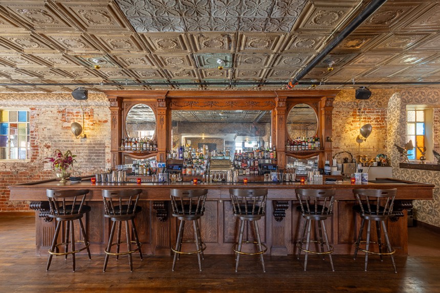 stools lined up at a bar