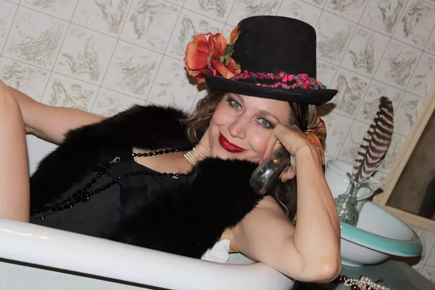 woman in lingerie and a top hat