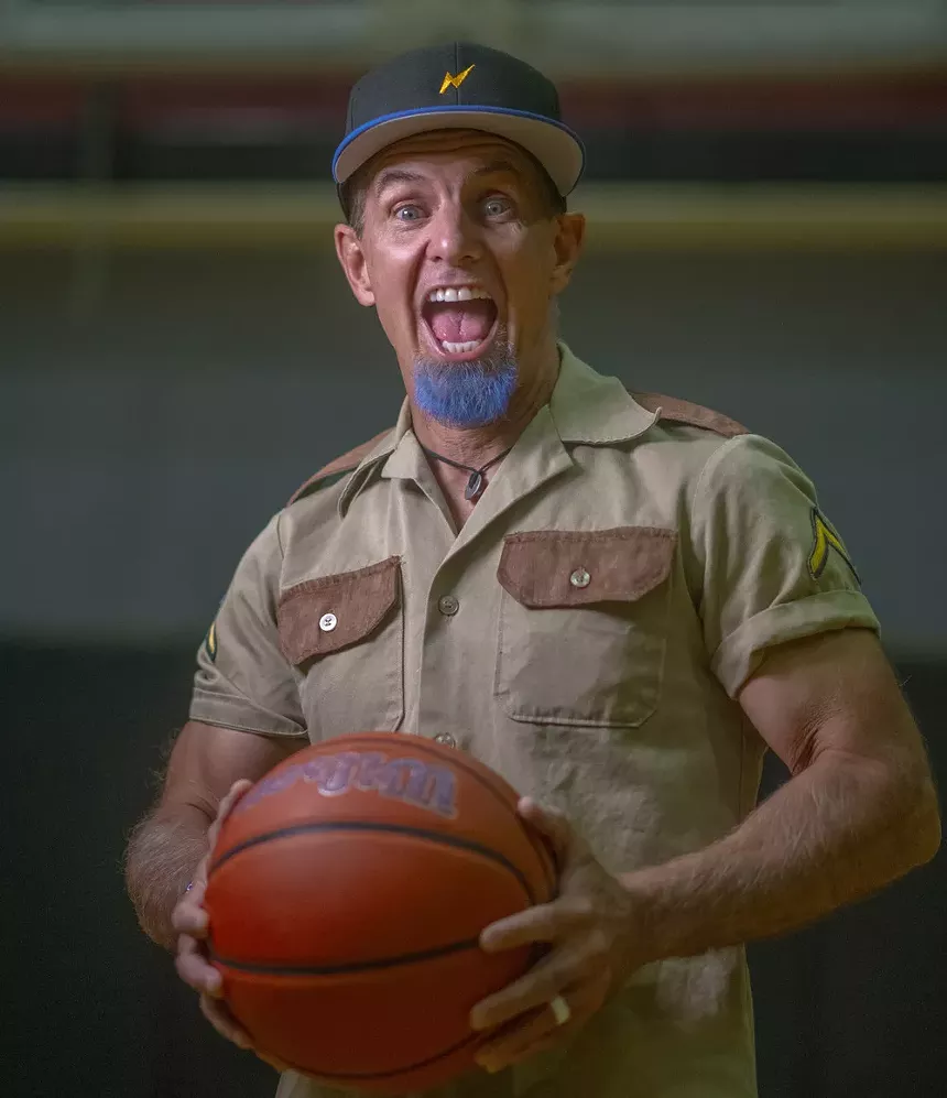 Man with basketball.