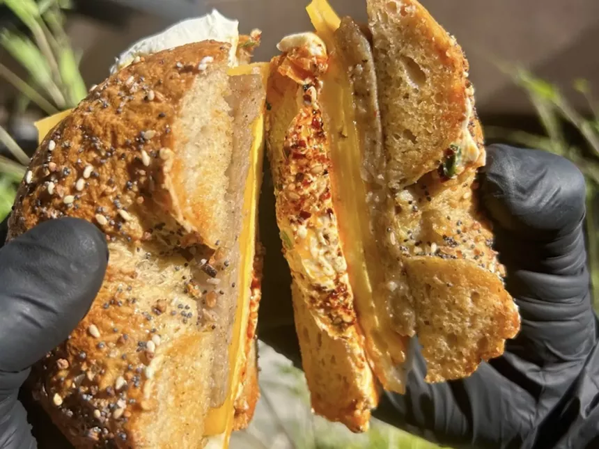 A halved bagel breakfast sandwich from Moore Bread