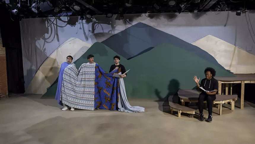 actors on set rehearsing Cannibal: The Musical