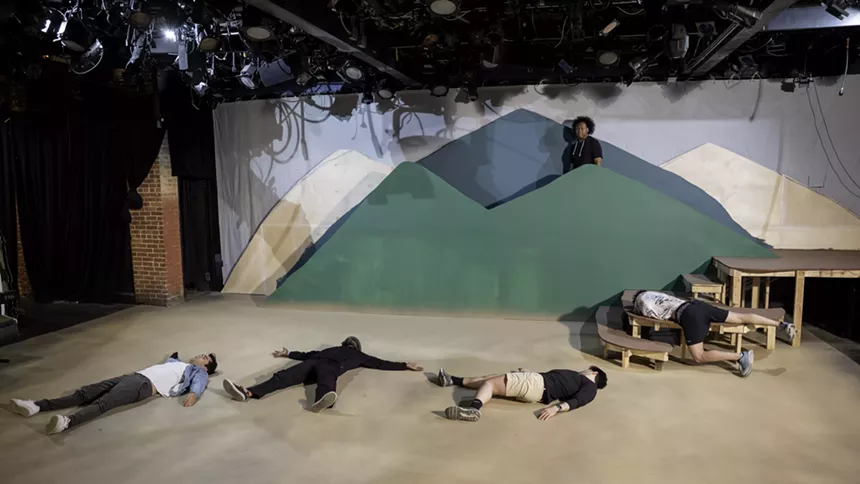 actors on set rehearsing Cannibal: The Musical