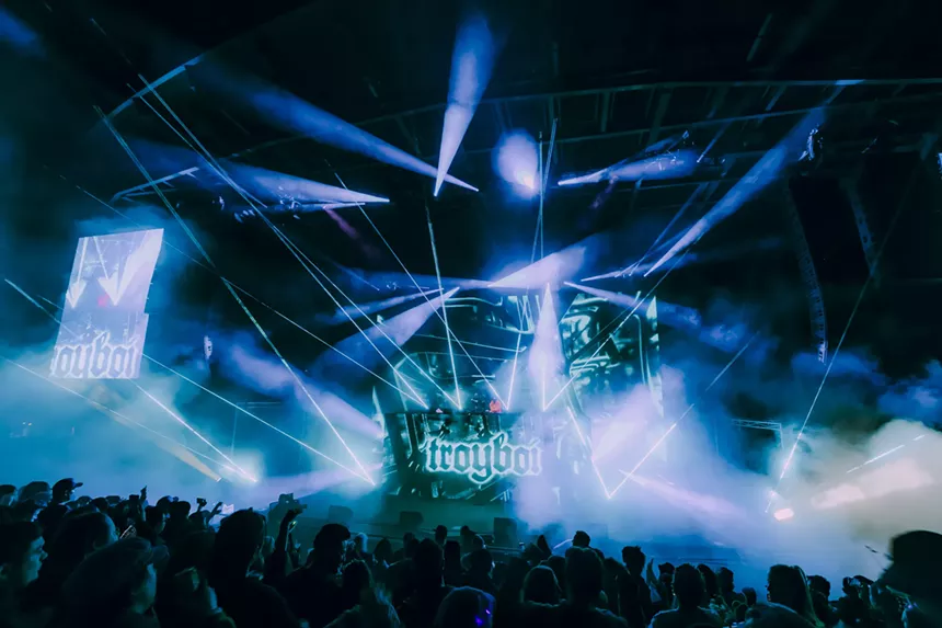 A photo showing the production lights and stage design during Troyboi's set at Red Rocks.
