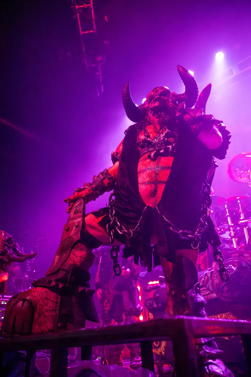 Gwar singing on stage